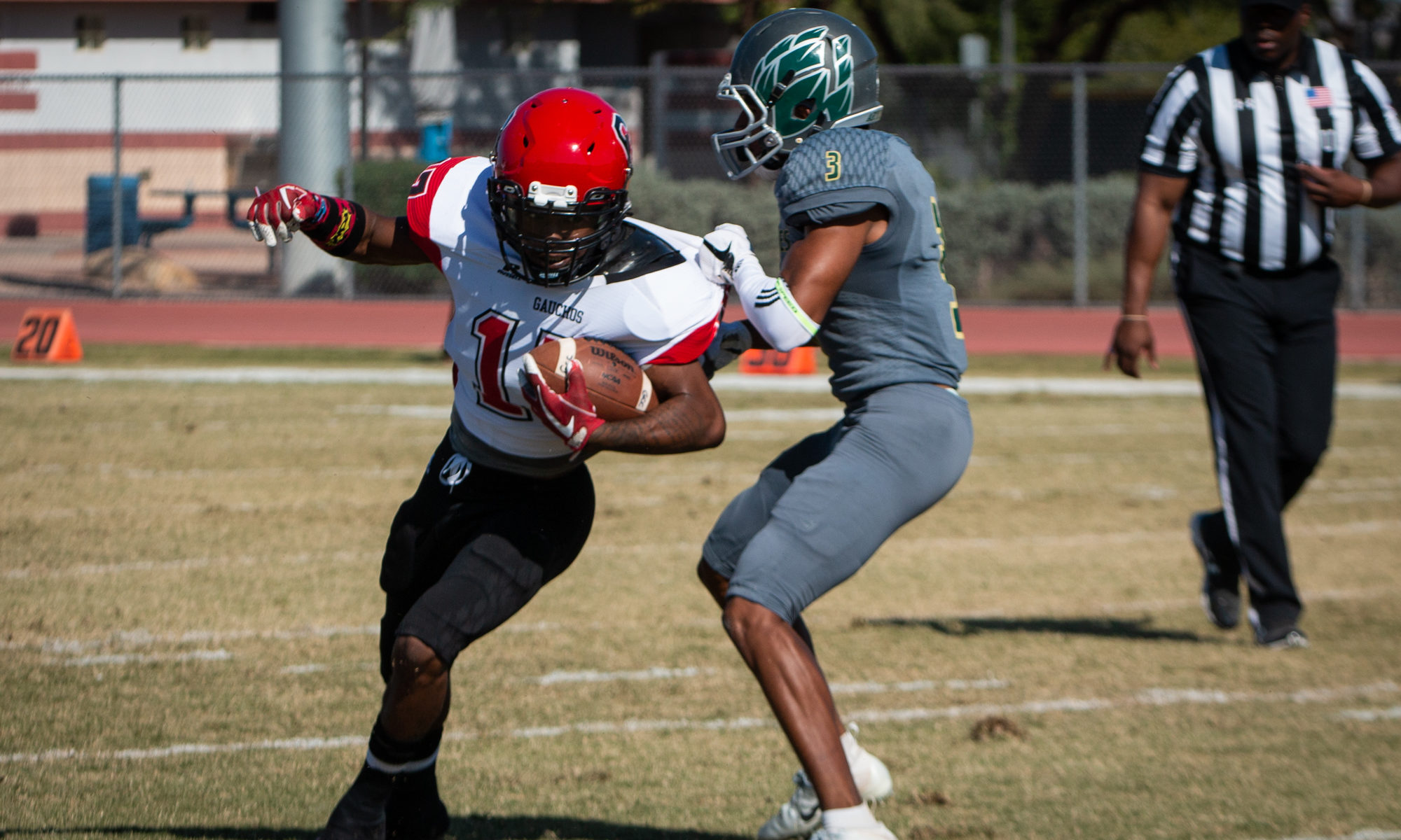 Freshman wide receiver Joe Parker fights through the tackle. He is one of 37 freshman on the Gaucho roster this season that played their first and only season of JUCO football in Maricopa County. (Photo by Sarah Farrell)