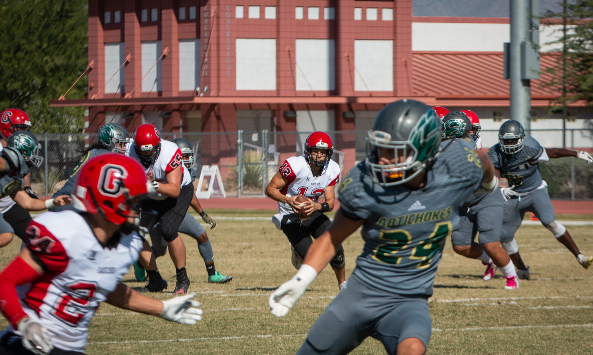 Sophomore quarterback Elijah Lorence escapes the pocket and takes off down field in the first half against Scottsdale. The Gaucho offense was explosive in the first half, but could not keep pace with the Artichokes as they fell 17-44. (Photo by Sarah Farrell)