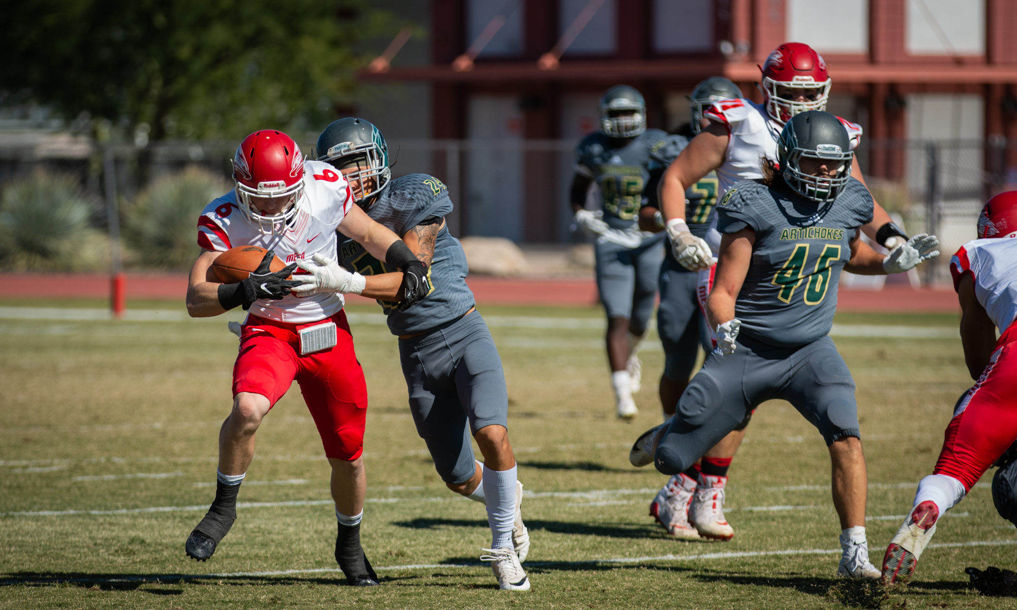 Freshman wide receiver Trevor Russell runs through the Scottsdale defense. The Thunderbirds dropped a close game in Scottsdale 22-38. (Photo by Sarah Farrell)
