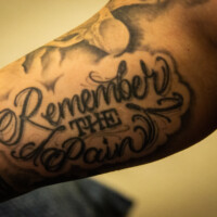 Growing up, Ben's father constantly said, "Remember where you came from." At the age of 14 after surviving a life-threatening accident, this translated to "Remember the Pain." Ben refuses to use his disabilities as an excuse, but instead as a driving force for improvement. Like this tattoo, his injuries are a constant reminder of what happened, and how far he has come. (Photo by Olivia Steinfeld)